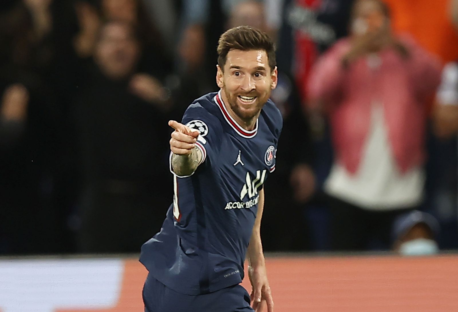 epa09494398 Paris Saint Germain's Lionel Messi celebrates scoring the 2-0 lead during the UEFA Champions League group A soccer match between PSG and Manchester City at the Parc des Princes stadium in Paris, France, 28 September 2021.  EPA/IAN LANGSDON