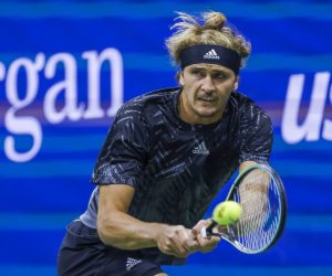 epa09460447 Alexander Zverev of Germany in action against Novak Djokovic of Serbia during a men's singles semifinal round match on the twelfth day of the US Open Tennis Championships at the USTA National Tennis Center in Flushing Meadows, New York, USA, 10 September 2021. The US Open runs from 30 August through 12 September.  EPA/JOHN G. MABANGLO