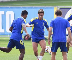 epa09465277 Juventus' Paulo Dybala (2-L) and teammates perform during their training session in Turin, Italy, 13 September 2021. Juventus FC will face Malmo FF in their UEFA Champions League group H soccer match on 14 September 2021.  EPA/Alessandro Di Marco