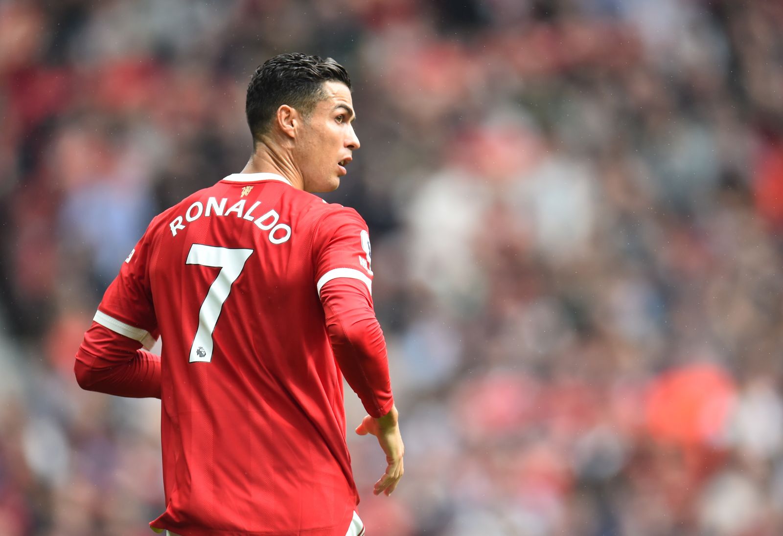 epa09487175 Cristiano Ronaldo of Manchester United reacts during the English Premier League soccer match between Manchester United and Aston Villa in Manchester, Britain, 25 September 2021.  EPA/Peter Powell EDITORIAL USE ONLY. No use with unauthorized audio, video, data, fixture lists, club/league logos or 'live' services. Online in-match use limited to 120 images, no video emulation. No use in betting, games or single club/league/player publications