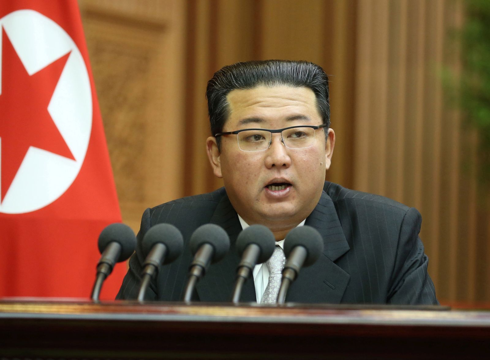 epa09496655 A photo released by the official North Korean Central News Agency (KCNA) showing the Supreme Leader of North Korea Kim Jong-un speaking during the second-day sitting of the 5th Session of the 14th Supreme People's Assembly of the Democratic People's Republic of Korea (DPRK) at the Mansudae Assembly Hall, in Pyongyang, North Korea, 30 September 2021.  EPA/KCNA   EDITORIAL USE ONLY