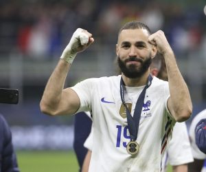 epa09517620 France's Karim Benzema celebrates after the UEFA Nations League final soccer match between Spain and France in Milan, Italy, 10 October 2021.  EPA/MATTEO BAZZI