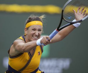 epa09522625 Victoria Azarenka of Belarus in action against Jessica Pegula of the US at the BNP Paribas Open tennis tournament at the Indian Wells Tennis Garden in Indian Wells, California, USA, 13 October 2021.  EPA/RAY ACEVEDO