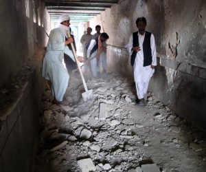 epa09525446 People inspect the scene of a bomb blasts during Friday congregational prayers at Shi'ite Muslims Mosque in Kandahar, Afghanistan, 15 October 2021. At least 32 worshipers died, and many others suffered injuries in a powerful explosion that ripped through a Shia mosque in the southern Afghan city of Kandahar during Friday prayers, officials said. The Islamic State has carried out numerous attacks, in recent years, against the Shia minority, especially the Hazaras. The Taliban have launched massive operations against the Islamic State in different Afghan provinces, aiming to finish a group that they consider the main threat to their government.  EPA/STRINGER