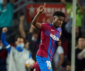epa09529121 FC Barcelona's striker Ansu Fati celebrates after scoring during the Spanish LaLiga soccer match between FC Barcelona and Valencia CF at Camp Nou stadium in Barcelona, Catalonia, north eastern Spain, 17 October 2021.  EPA/ALEJANDRO GARCIA