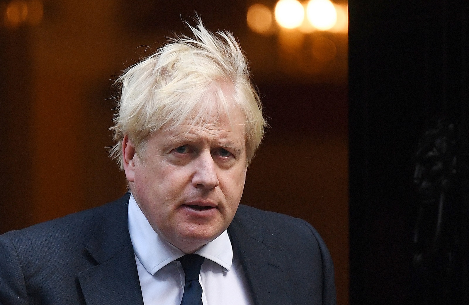 epa09533967 British Prime Minister Boris Johnson departs 10 Downing Street for Prime Minister's questions at parliament in London, Britain, 20 October, 2021.  EPA/ANDY RAIN