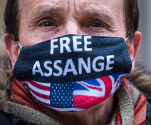 epa09541263 A protester wearing a ‘Free Assange’ mask attends a protest calling for the release of Wikileaks founder Julian Assange, who is on remand and fighting extradition to the United States, outside BBC Broadcasting House in London, Britain, 23 October 2021. Julian Assange is facing extradition to the United States over the publication of secrets relating to the wars in Afghanistan and Iraq.  EPA/VICKIE FLORES