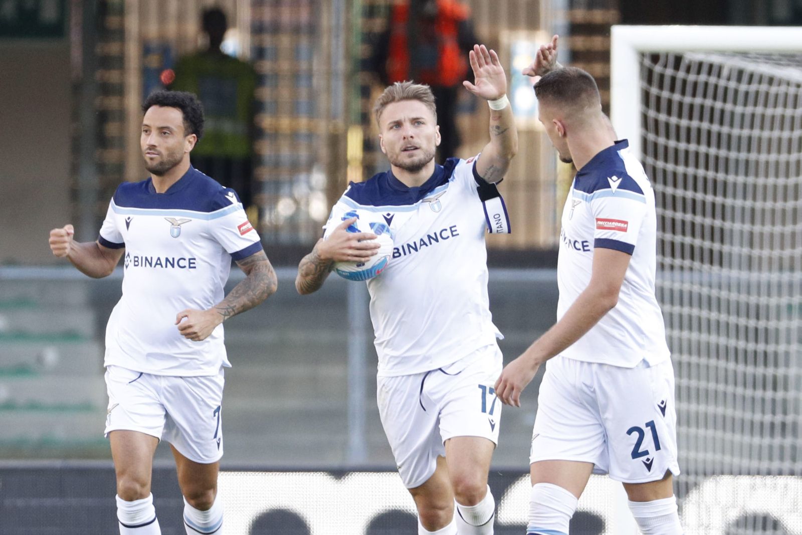 epa09543539 Lazio's Ciro Immobile (C) reacts after scoring his team's first goal during the Italian Serie A soccer match between Hellas Verona and SS Lazio in Verona, Italy, 24 October 2021.  EPA/EMANUELE PENNACCHIO