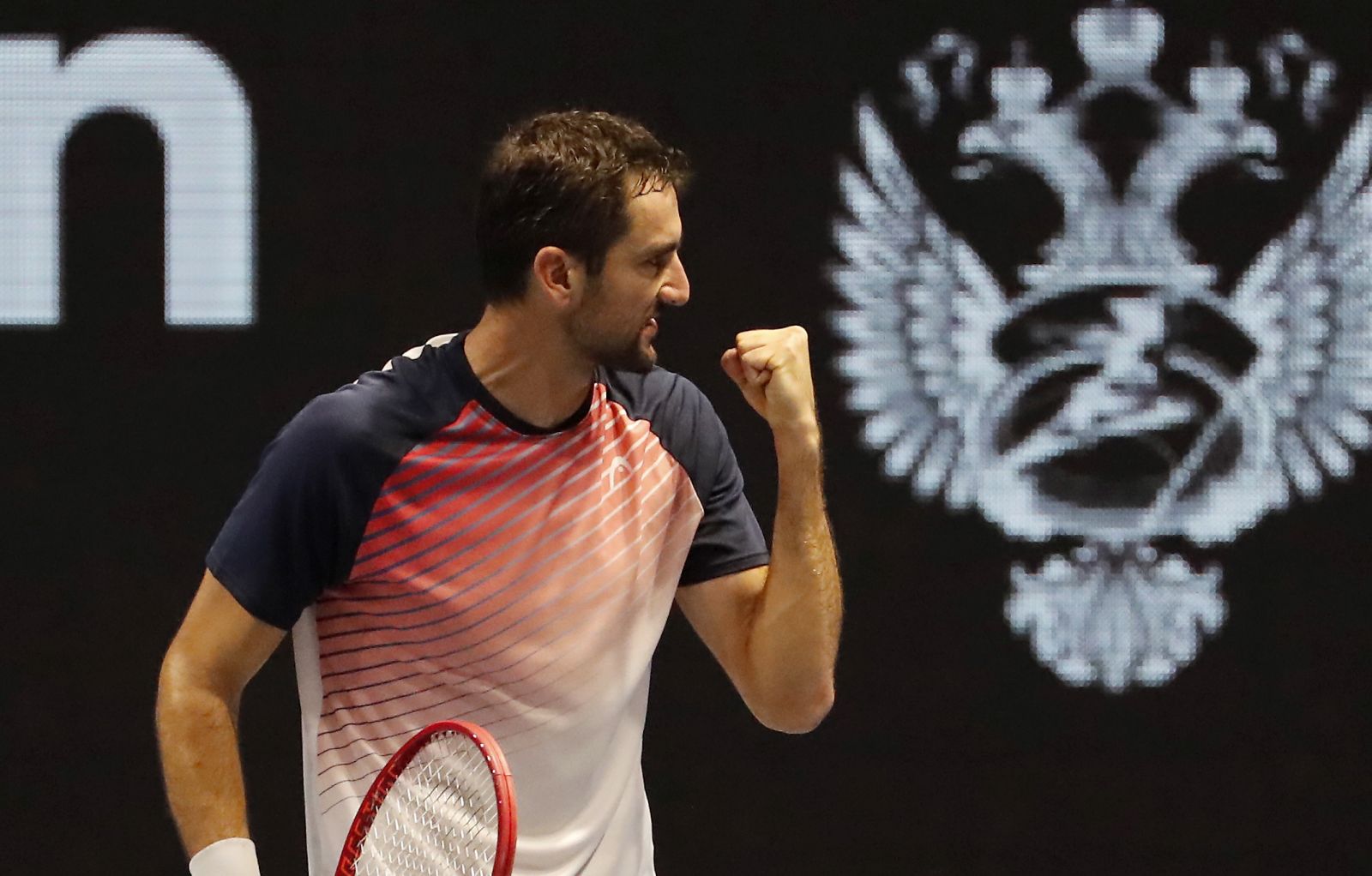 epa09552401 Marin Cilic of Croatia reacts during his quarterfinal match against Roberto Bautista Agut of Spain of the St.Petersburg Open ATP tennis tournament in St.Petersburg, Russia, 29 October 2021.  EPA/ANATOLY MALTSEV