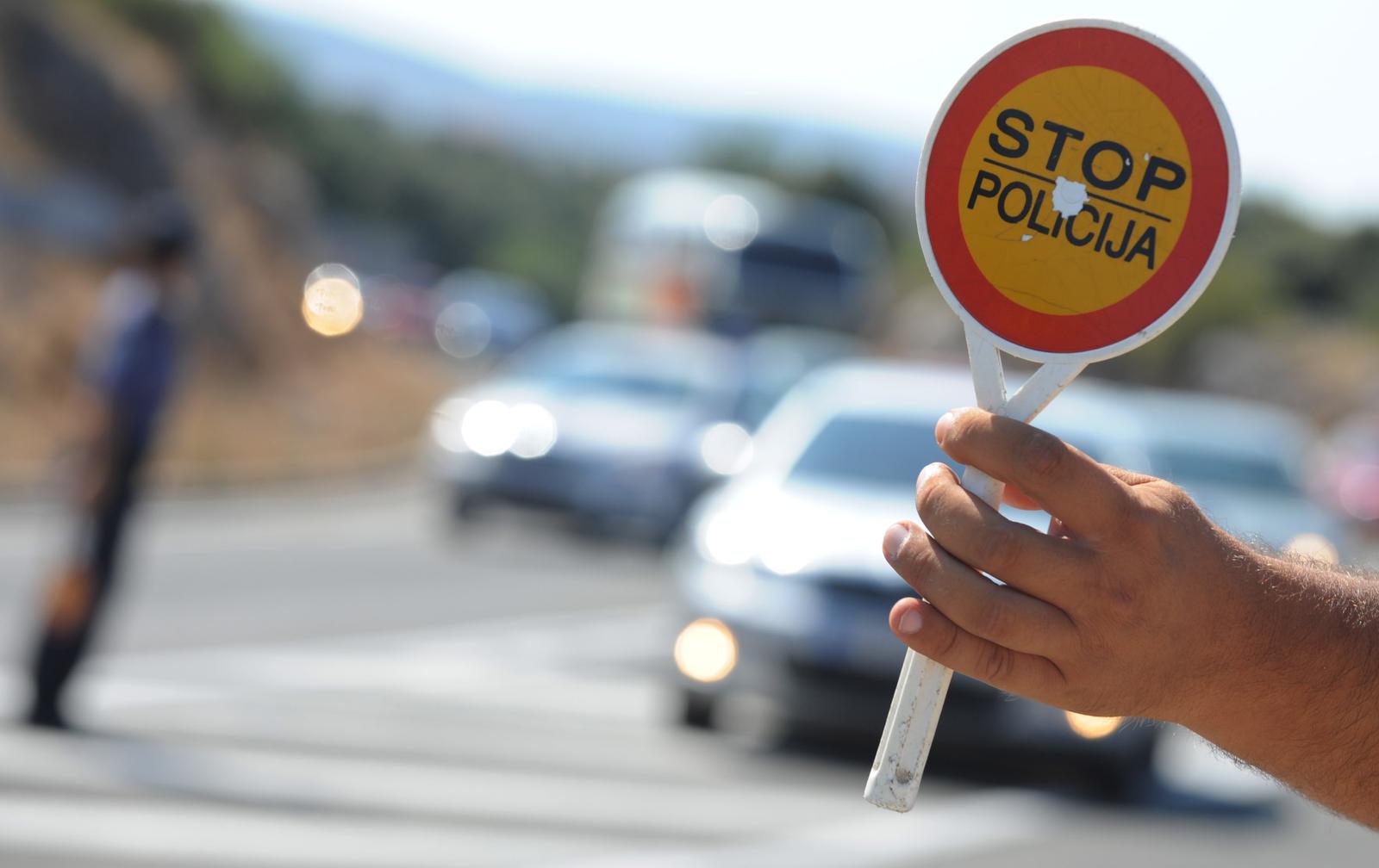 13.08.2013., Sibenik - Prometna policija s plocicom "Stop policija". 
Photo: Hrvoje Jelavic/PIXSELL
