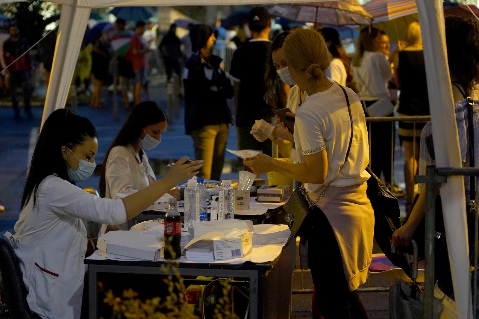 16, July, 2021, Belgrade - With the purchased ticket for the concert of Bajaga and Instruktor, the audience was able to do a free quick test at the checkpoints in front of the Tadmajdan stadium on the day of the concert.  Photo: Antonio Ahel/ATAImages

16, jul, 2021, Beograd - Uz kupljenu ulaznicu za koncert Bajage i Instruktora publika je mogla da uradi besplatno brzo testiranje na punktovima pred stadionom Tadmajdan na dan koncerta. Photo: Antonio Ahel/ATAImages