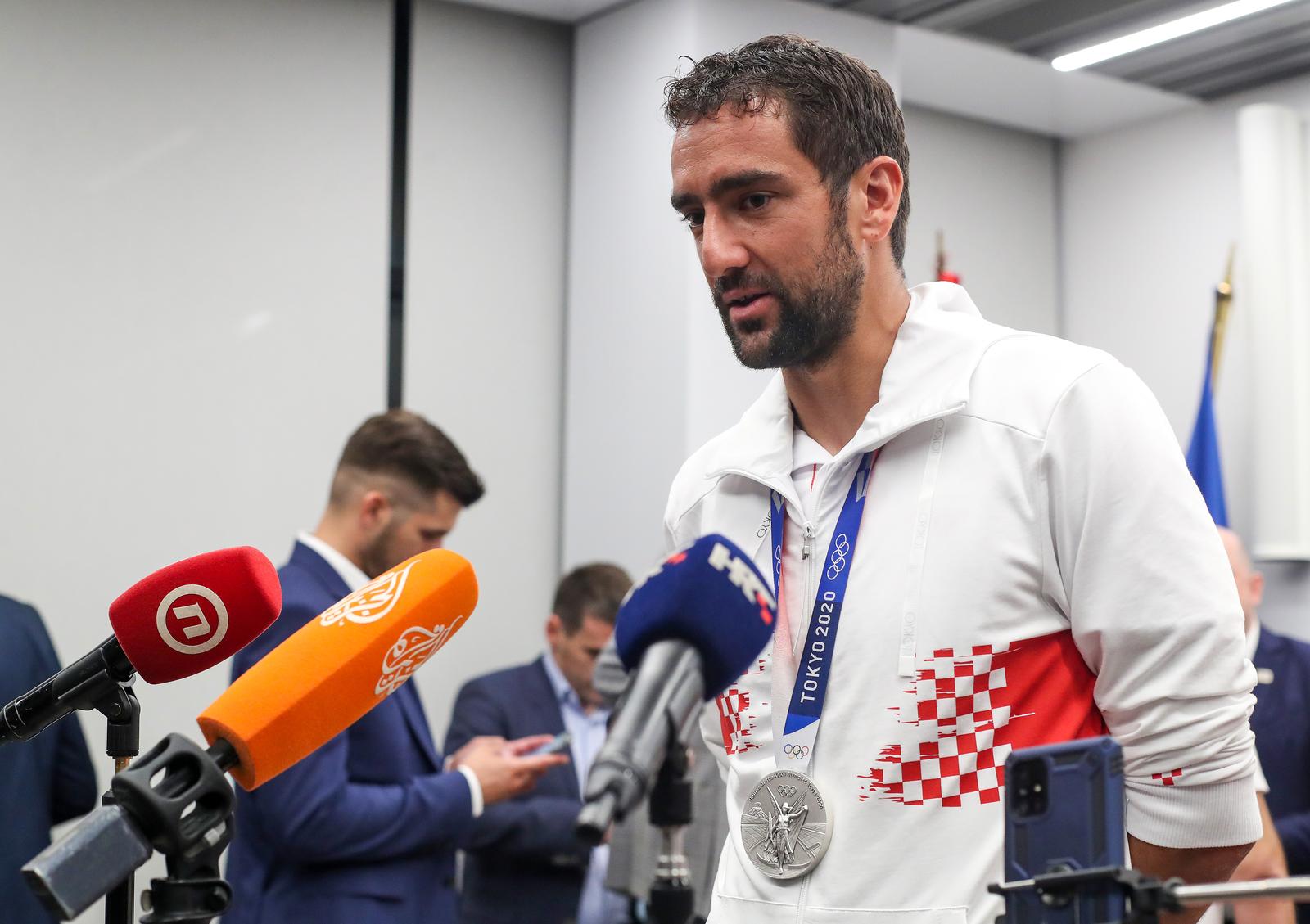 31.07.2021., Zagreb - U Zracnoj luci "dr. Franjo Tudjman" organiziran je svecani docek za hrvatske teniske olimpijce i osvajace medalja Mate Pavica, Nikole Mektica i Marina Cilica. Marin Cilic Photo: Luka Stanzl/PIXSELL