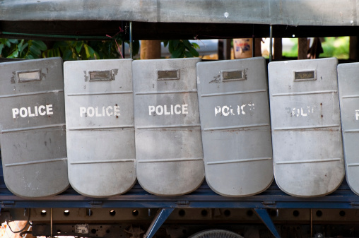 Riot police shields hanging from a truck parked outside the Shwedagon Pagoda in Yangon, Myanmar