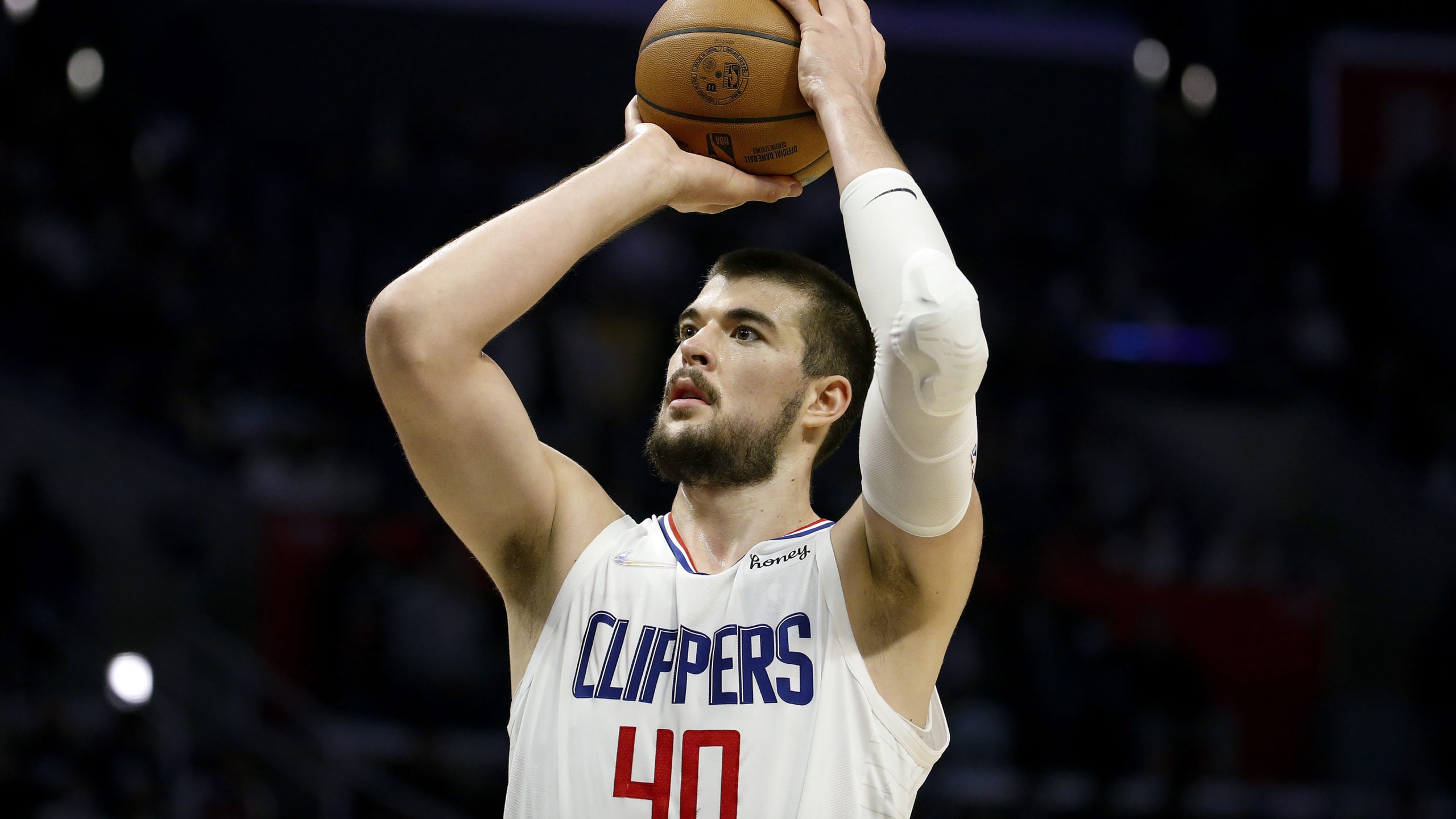 Los Angeles Clippers center Ivica Zubac (40) shoots free throw against the Charlotte Hornets during the second half of an NBA basketball game Sunday, Nov. 7, 2021, in Los Angeles. The Clippers won 120-106. (AP Photo/Ringo H.W. Chiu)