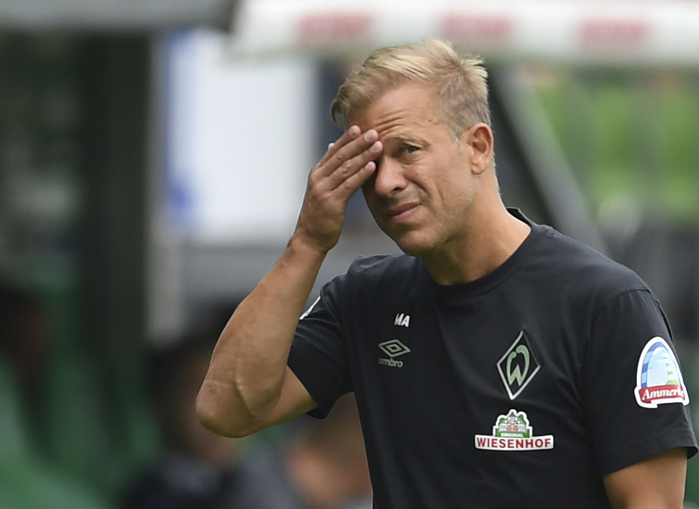 FILED - 15 August 2021, Bremen: Soccer: 2. Bundesliga, Werder Bremen - SC Paderborn 07, Matchday 3. Werder coach Markus Anfang is on the sidelines. He has resigned as coach of Werder Bremen. The 47-year-old thus reacted to investigations by the public prosecutor's office on Saturday (20.11.2021) a few hours before the home match against FC Schalke 04. It is suspected that Anfang used a forged vaccination certificate. Photo by: Carmen Jaspersen/picture-alliance/dpa/AP Images