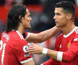 epa09501506 Cristiano Ronaldo (R) of Manchester United replaces Edinson Cavani (L) during the English Premier League soccer match between Manchester United and Everton FC in Manchester, Britain, 02 October 2021.  EPA/Peter Powell EDITORIAL USE ONLY. No use with unauthorized audio, video, data, fixture lists, club/league logos or 'live' services. Online in-match use limited to 120 images, no video emulation. No use in betting, games or single club/league/player publications