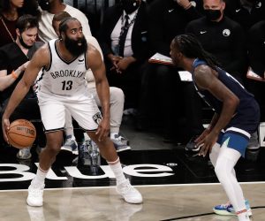 epa09524582 Brooklyn Nets guard James Harden (L) is defended by Minnesota Timberwolves forward Taurean Prince (R) in the first half of the NBA preseason basketball game between the Brooklyn Nets and the Minnesota Timberwolves at Barclays Center in  Brooklyn, New York, USA, 14 October 2021.  EPA/Peter Foley SHUTTERSTOCK OUT
