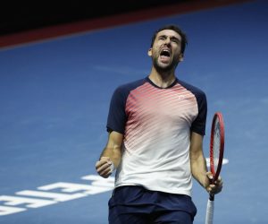 epa09554230 Marin Cilic of Croatia celebrates winning against Botic Van De Zandschulp of the Netherlands during their semi final match of the St.Petersburg Open ATP tennis tournament in St.Petersburg, Russia, 30 October 2021.  EPA/ANATOLY MALTSEV