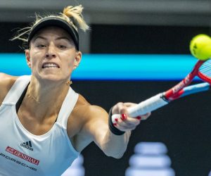 epa09560064 Angelique Kerber of Germany in action during her tennis match against Belinda Bencic of Switzerland at the Billie Jean King Trophy 2021 Finals in Prague, Czech Republic, 02 November 2021. Billie Jean King Trophy Finals matches will be held till 06 November 2021 in Prague.  EPA/MARTIN DIVISEK
