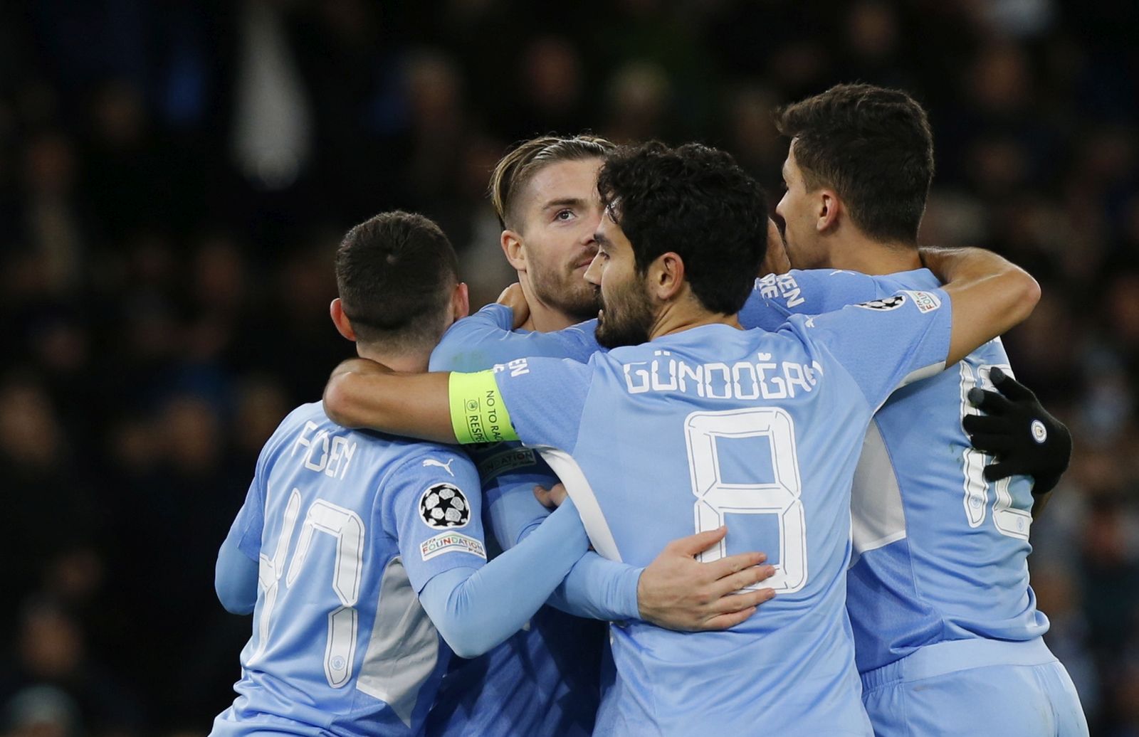 epa09562312 Players of Manchester City celebrate a goal during the UEFA Champions League group A soccer match between Manchester City and Club Brugge in Manchester, Britain, 03 November 2021.  EPA/MAGI HAROUN