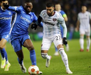 epa09564169 Mujaid Sadick (L) of Genk in action against Said Benrahma of West Ham during the UEFA Europa League group H soccer match between KRC Genk and West Ham United in Genk, Belgium, 04 November 2021.  EPA/OLIVIER HOSLET