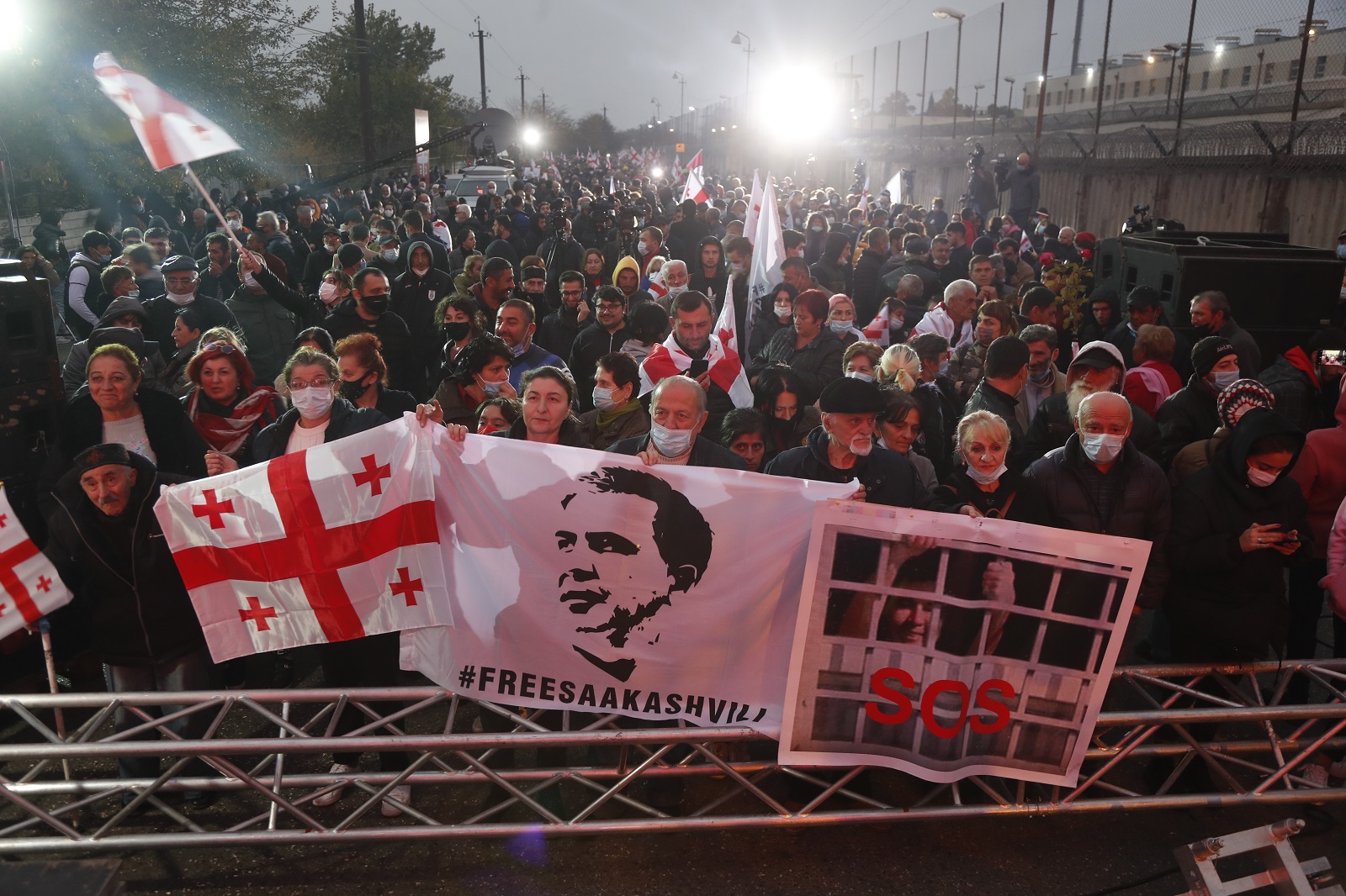 epa09567916 Participants of the 'United National Movement' gather for a protest against the arrest of the former Georgian President Mikheil Saakashvili, in front of the prison in Rustavi, Georgia, 06 November 2021. On October 01, Georgian authorities detained Saakashvili after he returned to the country after eight years of emigration. The politician himself stated that he had come to Georgia to participate in protest actions after the elections. In Georgia, he was sentenced by a court to prison for abuse of office. He left the country in 2013.  EPA/ZURAB KURTSIKIDZE