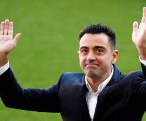 epaselect epa09571272  FC Barcelona's new head coach, Xavi Hernandez, waves to fans during his presentation at Camp Nou stadium in Barcelona, Spain, 08 November 2021. Xavi Hernandez left Al-Sadd club of Qatar to lead FC Barcelona for the rest of the current season and two more seasons.  EPA/Alejandro García