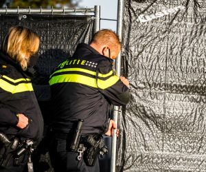 epa09572137 Police investigate at a caravan camp in Bergeijk, The Netherlands, 09 November 2021. The police raided several places in the Netherlands and Belgium in an investigation against drug production and trafficking.  EPA/ROB ENGELAAR