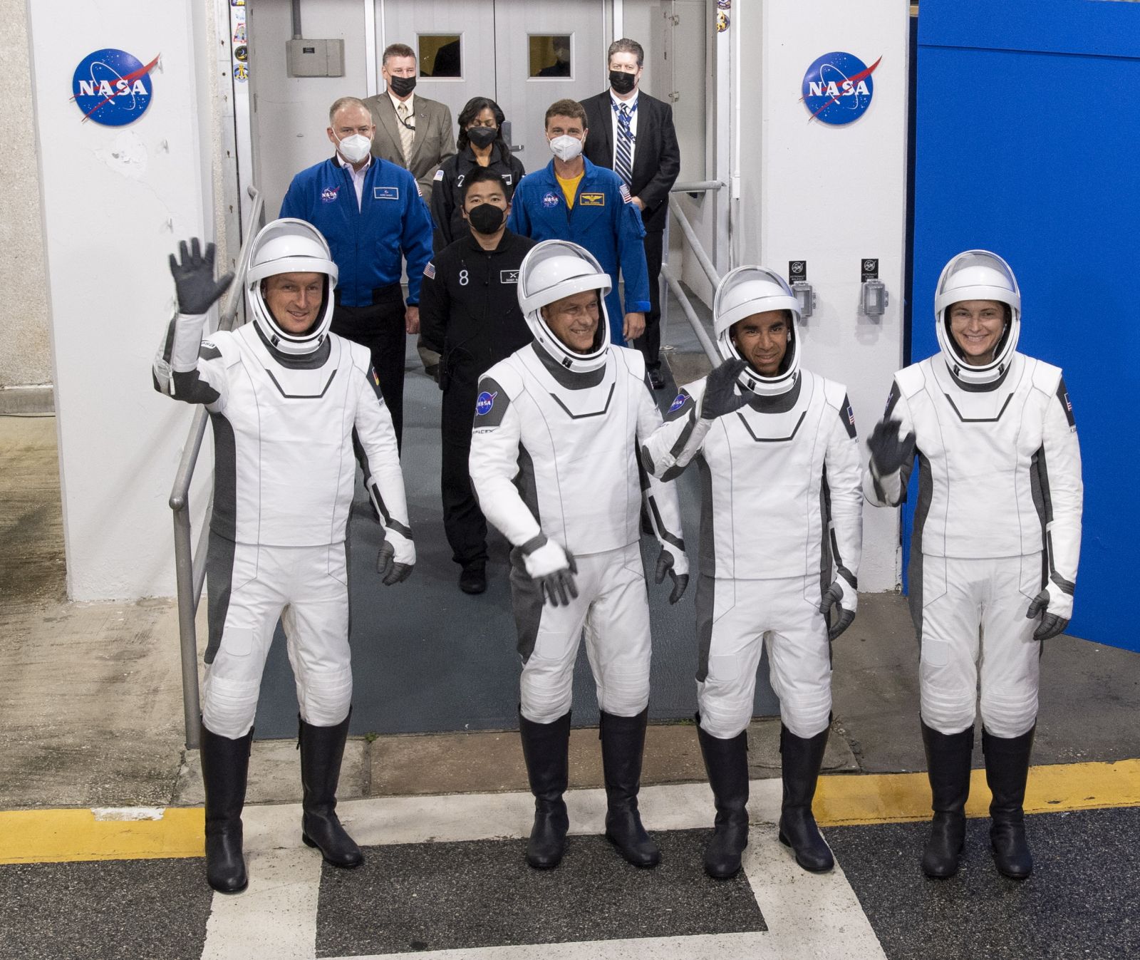epa09574939 A handout photo made available by NASA showing ESA (European Space Agency) astronaut Matthias Maurer (L) and NASA astronauts Tom Marshburn (2-L), Raja Chari (2-R), and Kayla Barron (R), wearing SpaceX spacesuits, are seen as they prepare to depart the Neil A. Armstrong Operations and Checkout Building for Launch Complex 39A to board the SpaceX Crew Dragon spacecraft for the Crew-3 mission launch, at NASA's Kennedy Space Center in Florida, USA, 10 November 2021. NASA’s SpaceX Crew-3 mission is the third crew rotation mission of the SpaceX Crew Dragon spacecraft and Falcon 9 rocket to the International Space Station as part of the agency's Commercial Crew Program. Chari, Marshburn, Barron, Maurer are scheduled to launch at 9:03 p.m. EST, from Launch Complex 39A at the Kennedy Space Center.  EPA/Joel Kowsky / NASA / HANDOUT  HANDOUT EDITORIAL USE ONLY/NO SALES