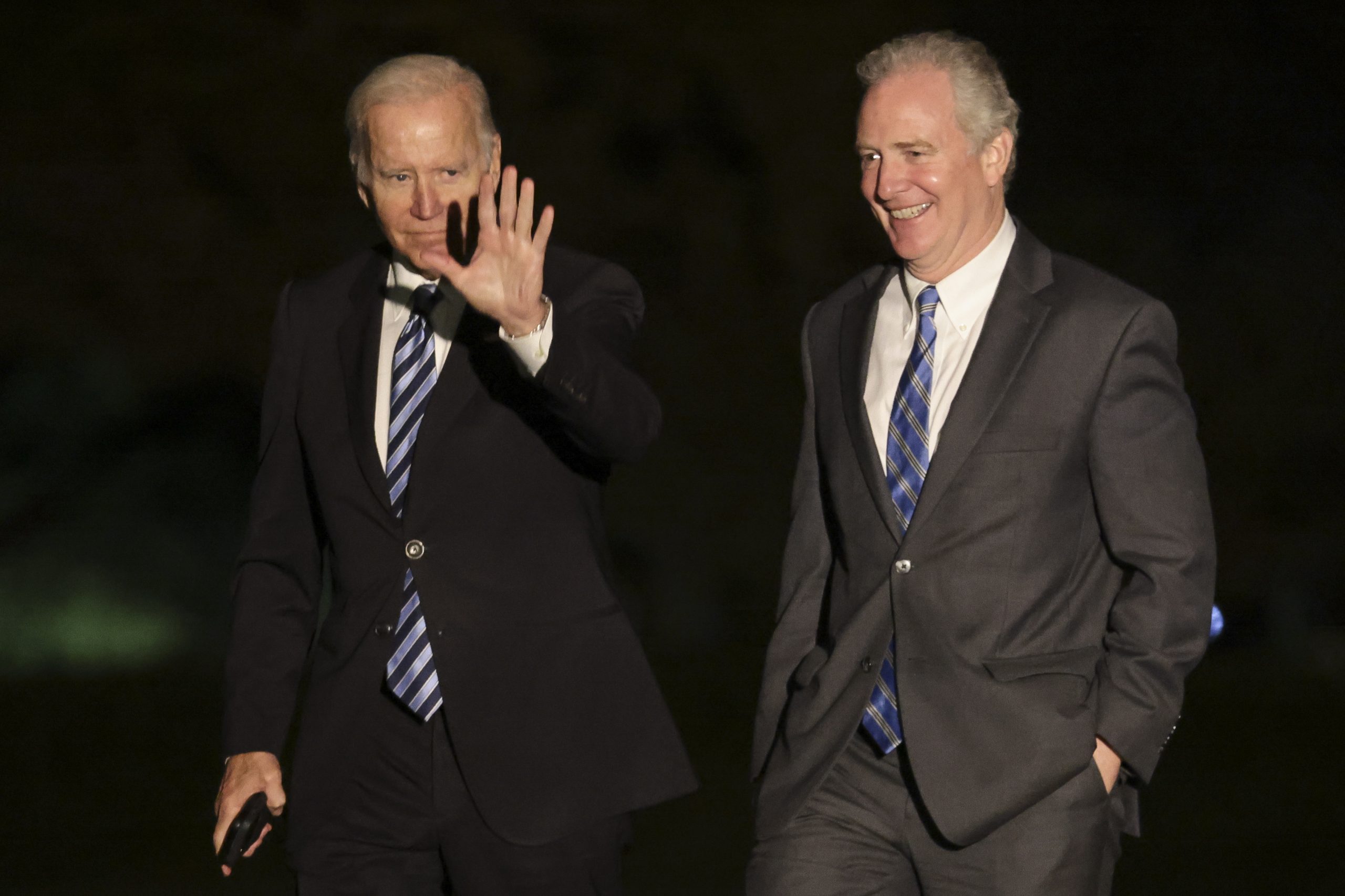epa09574930 US President Joe Biden and Senator Chris Van Hollen, D-MD, walk on the South Lawn of the White House in Washington, DC, USA, 10 November 2021. President Biden delivered remarks on how the Bipartisan Infrastructure Deal delivers for the American people by upgrading the nation's ports and strengthening supply chains to prevent disruptions in an event in Baltimore, Maryland.  EPA/Oliver Contreras / POOL