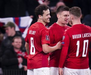 epa09579586 Denmark's Joakim Maehle (C)  celebrates scoring the 3-1 with Thomas Delaney (L) and Jacob Bruun Larsen (R) during the FIFA World Cup 2022 qualifier between Denmark - Faroe Islands in Copenagen, Denmark, 12 November 2021.  EPA/Liselotte Sabroe DENMARK OUT