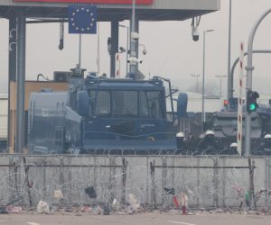 epa09587362 A handout photo made available by Belta news agency shows security deployed at the Belarusian-Polish border near the Bruzgi-Kuznica checkpoint, in the Grodno region, Belarus, 17 November 2021. Asylum-seekers, refugees and migrants from the Middle East arrived at the Belarusian-Polish checkpoint of Bruzgi-Kuznica aiming to cross the border. Thousands of people, who want to obtain asylum in the European Union, have been trapped at low temperatures at the Polish-Belarus border since 08 November.  EPA/LEONID SCHEGLOV/BELTA HANDOUT -- MANDATORY CREDIT -- HANDOUT EDITORIAL USE ONLY/NO SALES