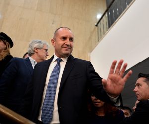 epa09596701 Newly elected current Bulgaria's President Rumen Radev (C) speaks to journalists after his victory in the presidential election in Sofia, Bulgaria, 21 November 2021. Bulgarian President Rumen Radev convincingly wins run-off against his opponent Anastas Gerdjikov.  EPA/VASSIL DONEV