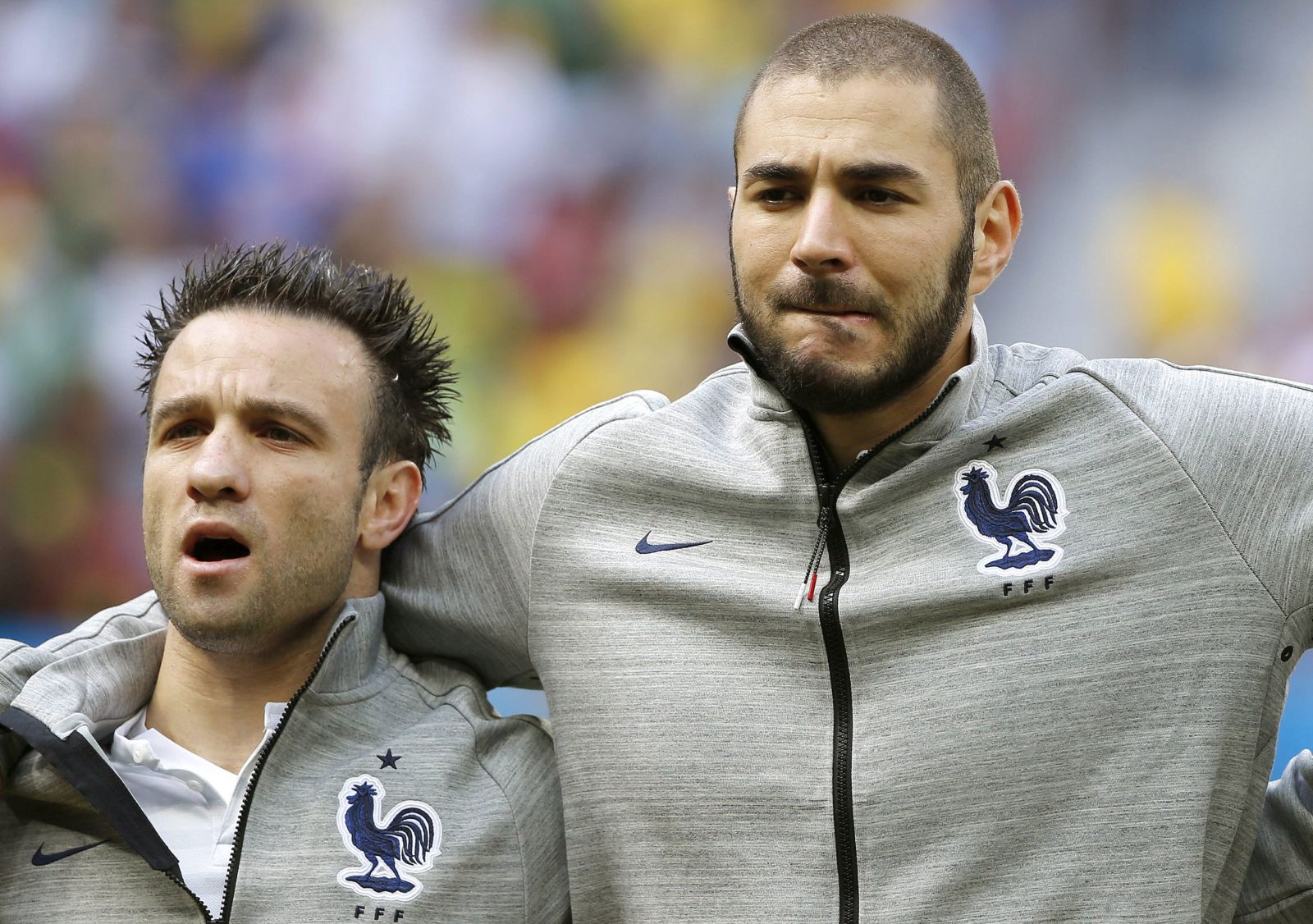 epa09600573 (FILE) - French players Mathieu Valbuena (L) and Karim Benzema prior to the FIFA World Cup 2014 round of 16 match between France and Nigeria at the Estadio Nacional in Brasilia, Brazil, 30 June 2014 (re-issued on 24 November 2021). On 24 November 2021 Benzema has been found guilty of conspiring to blackmail French forrmer teammate Mathieu Valbuena. Benzema was given one year suspended sentence and 75.000 euro fine.  EPA/JORGE ZAPATA   EDITORIAL USE ONLY  EDITORIAL USE ONLY *** Local Caption *** 52455256