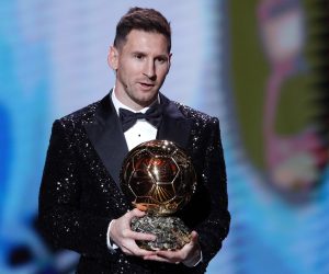 epa09611690 PSG player Lionel Messi wins the Men's Ballon d'Or at the 2021 Ballon d'Or ceremony at Theatre du Chatelet in Paris, France, 29 November 2021.  EPA/YOAN VALAT