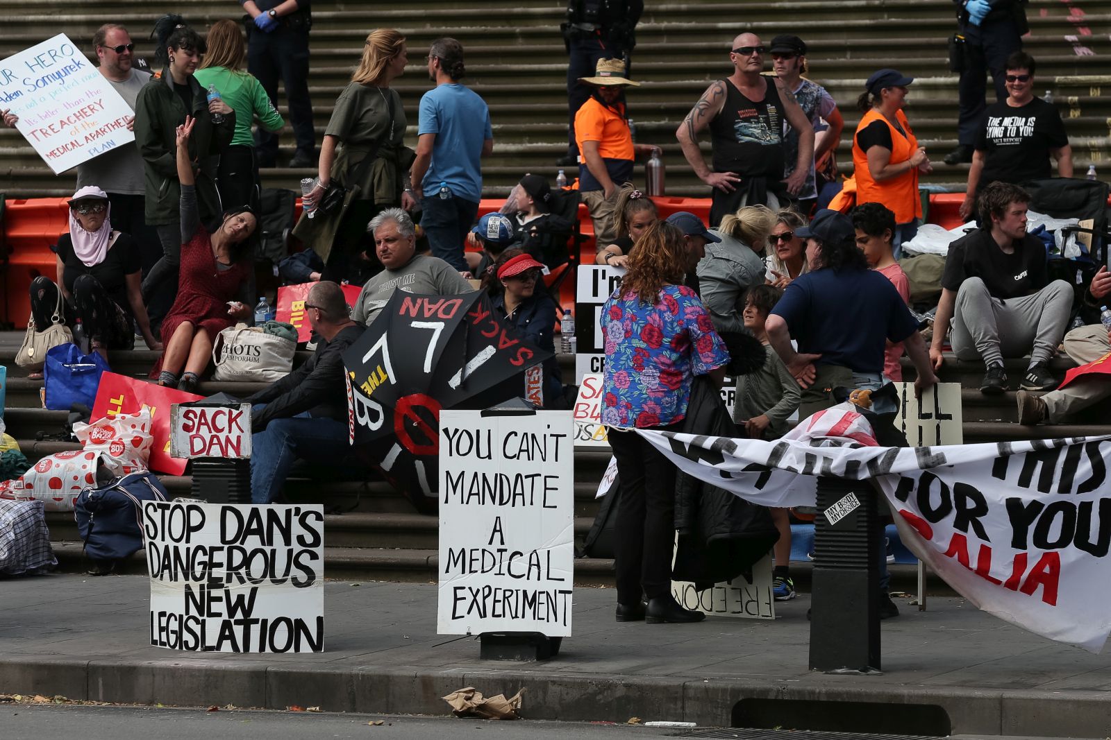 epa09588612 Protesters are seen during a demonstration outside the Victorian State Parliament, in Melbourne, Australia, 18 November 2021. Controversial pandemic laws are being debated in the Victorian parliament amid heated protests, including a mock execution of the premier.  EPA/CON CHRONIS AUSTRALIA AND NEW ZEALAND OUT