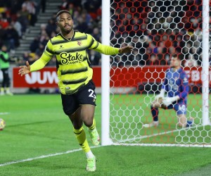 Soccer Football - Premier League - Brentford v Watford - Brentford Community Stadium, London, Britain - December 10, 2021 Watford's Emmanuel Dennis celebrates scoring their first goal REUTERS/David Klein EDITORIAL USE ONLY. No use with unauthorized audio, video, data, fixture lists, club/league logos or 'live' services. Online in-match use limited to 75 images, no video emulation. No use in betting, games or single club /league/player publications.  Please contact your account representative for further details.