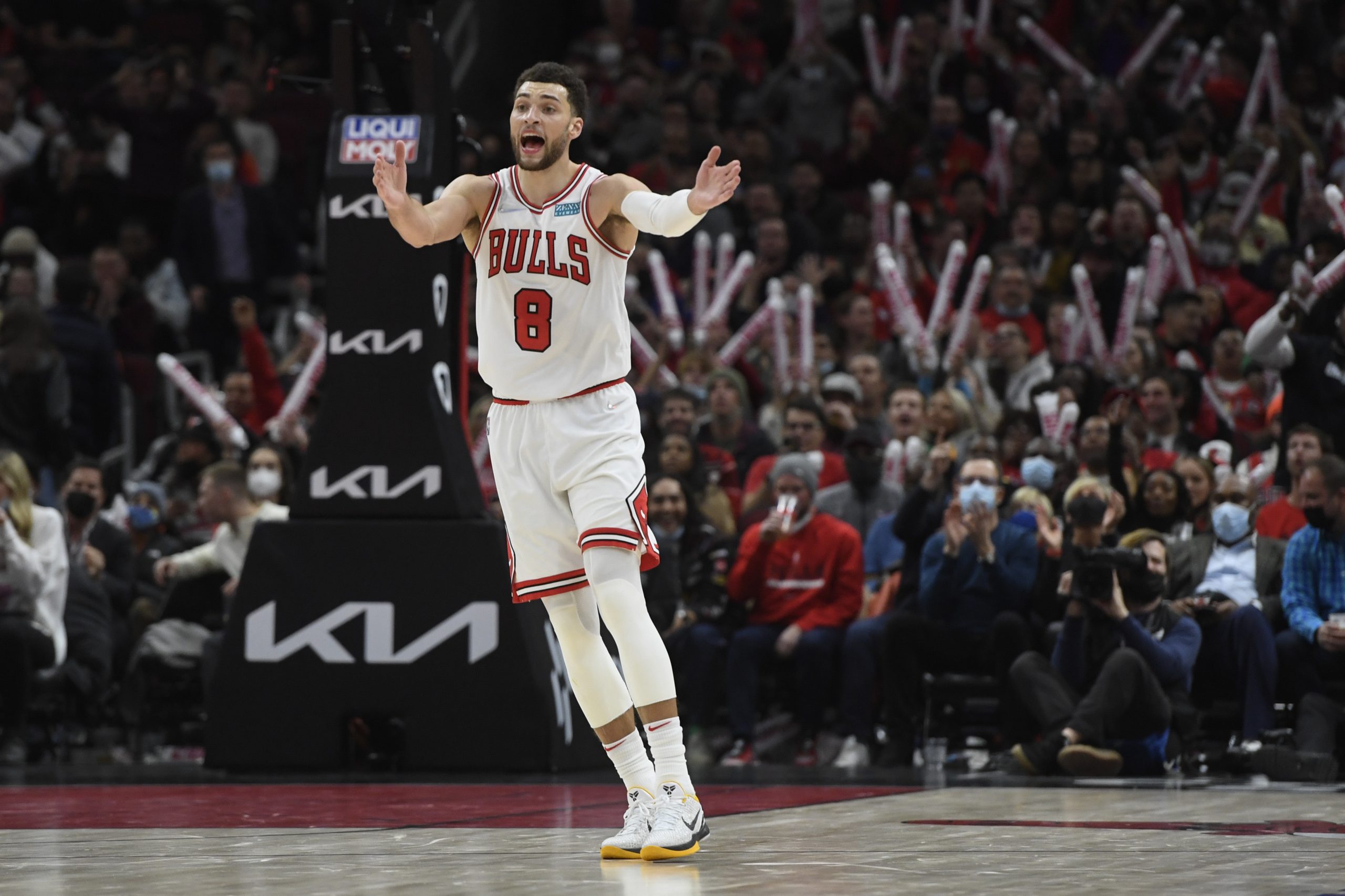 Chicago Bulls guard Zach LaVine claps after scoring against the Denver Nuggets during the second half of an NBA basketball game Monday, Dec. 6, 2021, in Chicago. (AP Photo/Matt Marton)