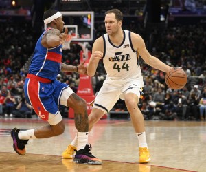 Utah Jazz forward Bojan Bogdanovic (44) dribbles the ball against Washington Wizards guard Bradley Beal (3) during the first half of an NBA basketball game, Saturday, Dec. 11, 2021, in Washington. (AP Photo/Nick Wass)