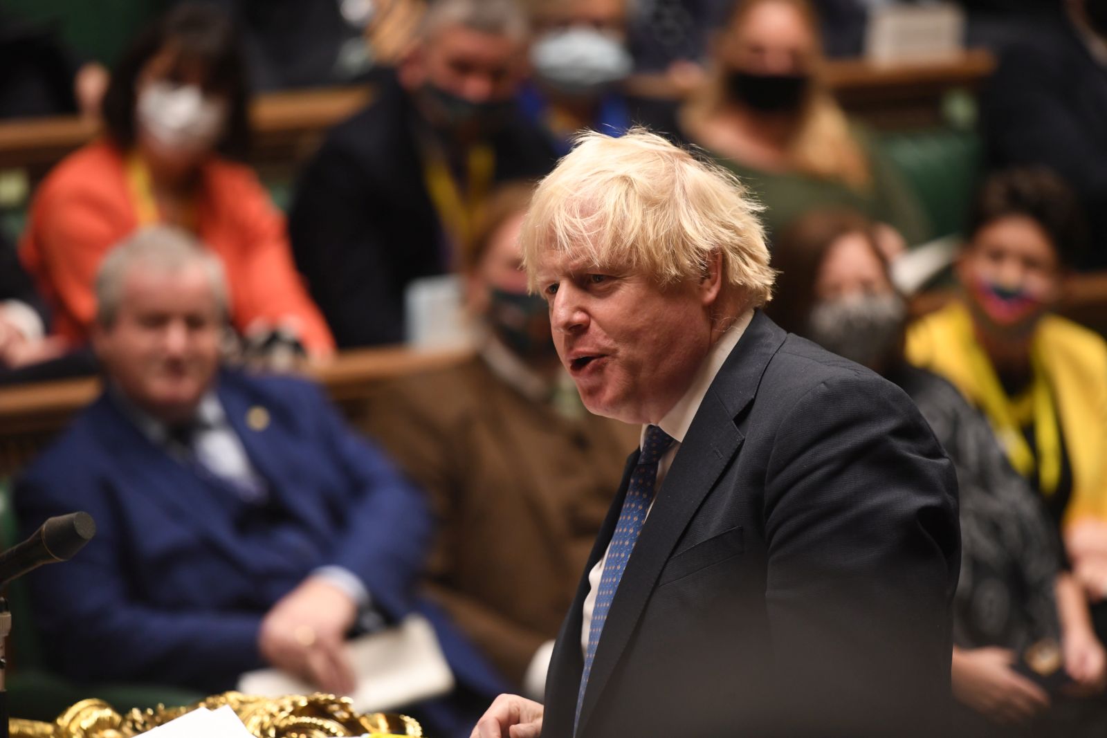 epa09600730 A handout photograph released by the UK Parliament shows British Prime Minister Boris Johnson during Prime Minister's Questions in the House of Commons in Westminster, London, Britain, 24 November 2021.  EPA/UK PARLIAMENT/JESSICA TAYLOR HANDOUT  HANDOUT EDITORIAL USE ONLY/NO SALES
