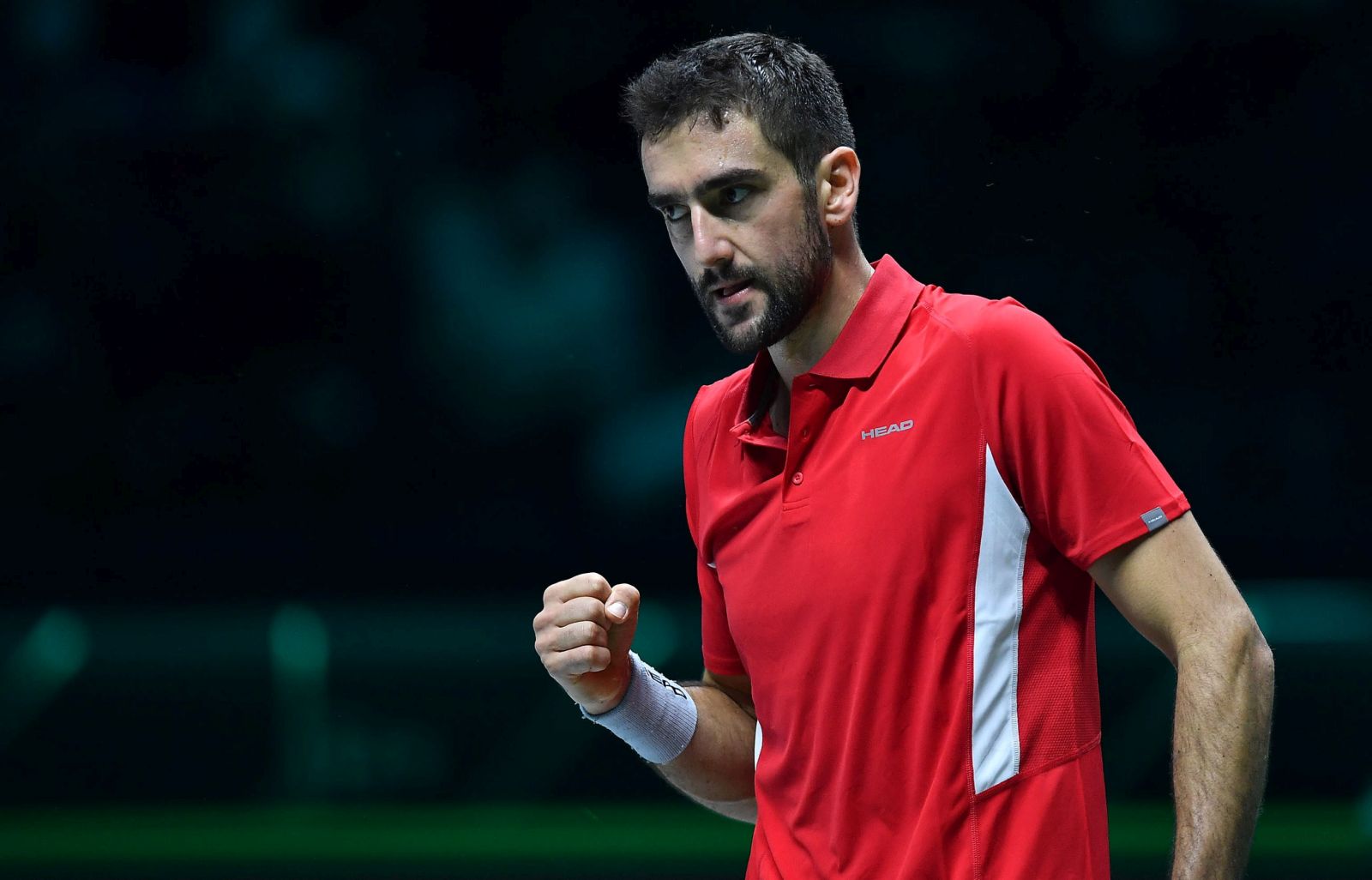 epa09611616 Marin Cilic of Croatia reacts during the match against  Jannik Sinner of Italy at the Davis Cup in Turin, Italy, 29 November 2021.  EPA/Alessandro Di Marco