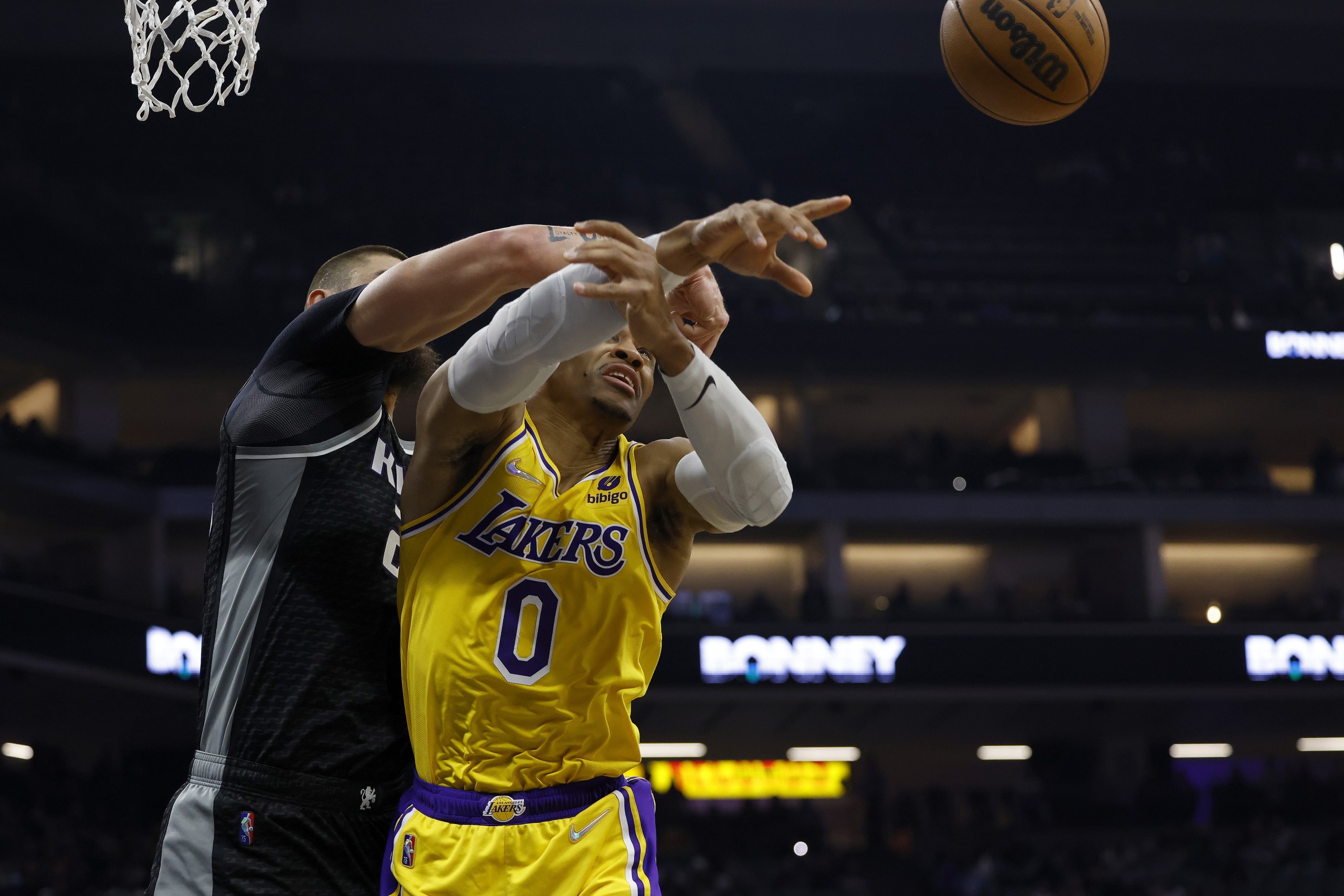 epa09613959 Los Angeles Lakers guard Russell Westbrook (R) AND Sacramento Kings center Alex Len (L) in action during the first half of their NBA game at the Golden 1 Center in Sacramento, California, USA, 30 November 2021.  EPA/JOHN G. MABANGLO  SHUTTERSTOCK OUT