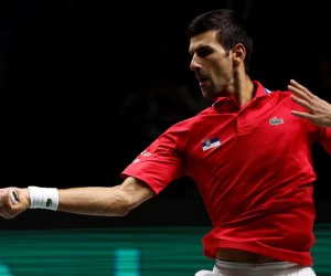 epa09615062 Novak Djokovic of Serbia in action against Alexander Bublik of Kazakhstan during their round-of-16 Davis Cup tie between Kazakhstan and Serbia held at Madrid Arena tennis complex in Madrid, central Spain, 01 December 2021.  EPA/JUANJO MARTIN