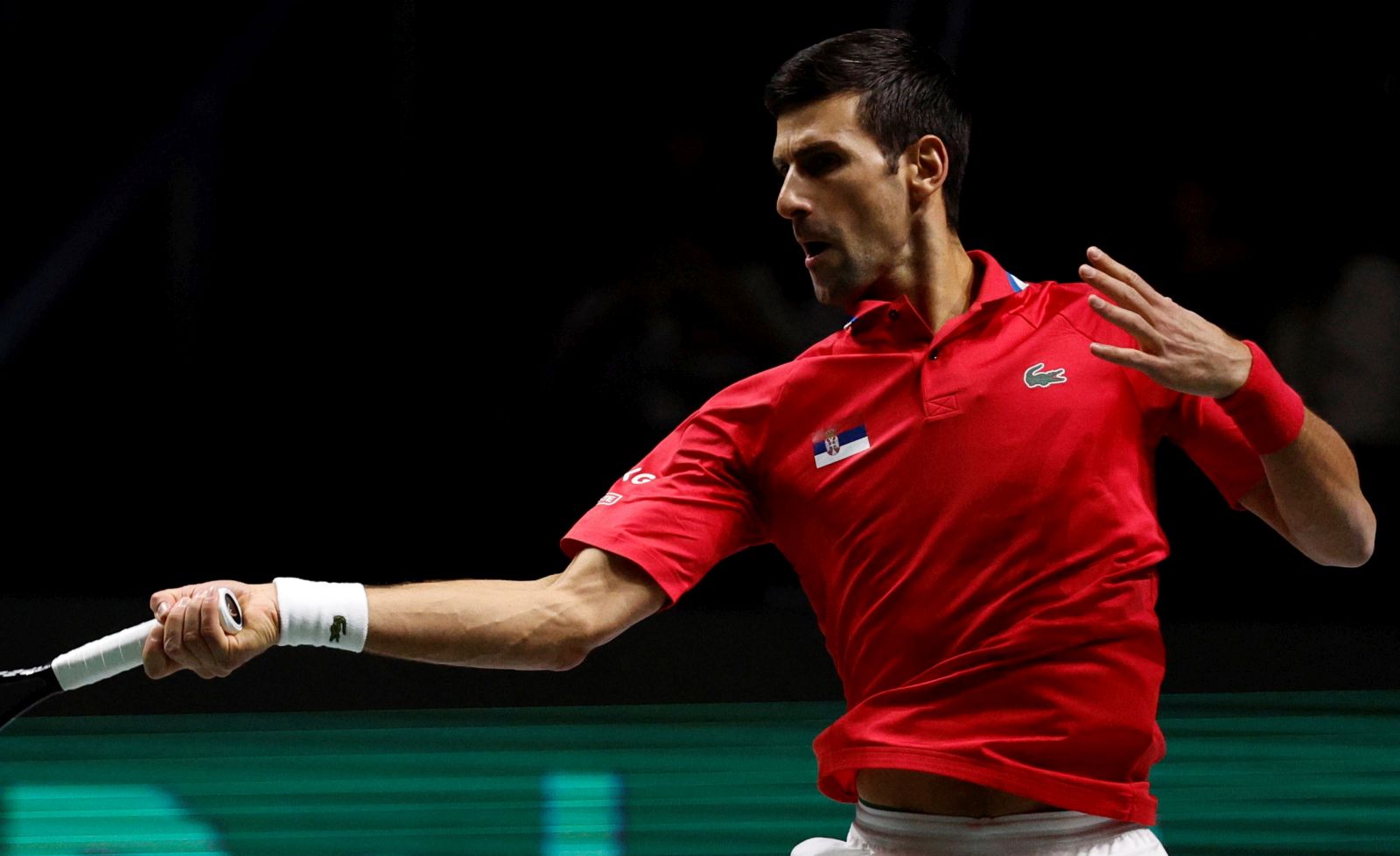 epa09615062 Novak Djokovic of Serbia in action against Alexander Bublik of Kazakhstan during their round-of-16 Davis Cup tie between Kazakhstan and Serbia held at Madrid Arena tennis complex in Madrid, central Spain, 01 December 2021.  EPA/JUANJO MARTIN