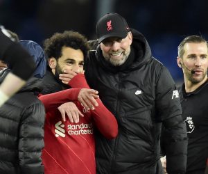 epa09615521 Liverpool manager Juergen Klopp (2-R) hugs his player Mohamed Salah (L) after winning the English Premier League soccer match between Everton FC and Liverpool FC in Liverpool, Britain, 01 December 2021.  EPA/PETER POWELL EDITORIAL USE ONLY. No use with unauthorized audio, video, data, fixture lists, club/league logos or 'live' services. Online in-match use limited to 120 images, no video emulation. No use in betting, games or single club/league/player publications