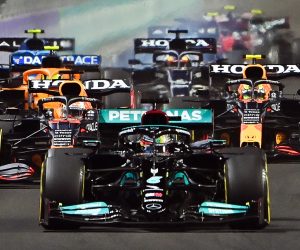 epa09624652 British Formula One driver Lewis Hamilton (front) of Mercedes-AMG Petronas is on his way to win the inaugural 2021 Formula One Grand Prix of Saudi Arabia at the Jeddah Corniche Circuit in Jeddah, Saudi Arabia, 05 December 2021.  EPA/STR