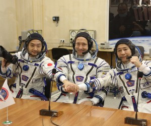 epa09628875 A handout photo made available by the official website of the Russian State Space Corporation ROSCOSMOS shows members of the main crew of the new Soyuz mission to the International Space Station (ISS) Roscosmos cosmonaut Alexander Misurkin (C), space flight participants Yusaku Maezawa (R) and Yozo Hirano (L) after their space suits check shortly before the launch at the Russian leased Baikonur cosmodrome, Kazakhstan, 08  December 2021. Japanese entrepreneur Yusaku Maezawa and his production assistant Yozo Hirano, led by Roscosmos cosmonaut Alexander Misurkin, will take part in a mission to the International Space Station (ISS) scheduled for 08 December 2021.  EPA/ROSCOSMOS PRESS SERVICE HANDOUT  HANDOUT EDITORIAL USE ONLY/NO SALES