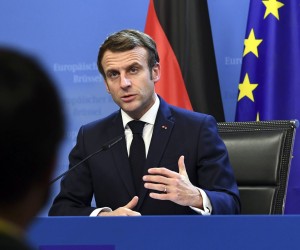 epa09645879 France's President Emmanuel Macron speaks during a joint press conference with Germany's Chancellor Olaf Scholz (out of frame) during an European Union (EU) summit at the European Council Building at the EU headquarters in Brussels, Belgium, 17 December 2021.  EPA/JOHN THYS / POOL