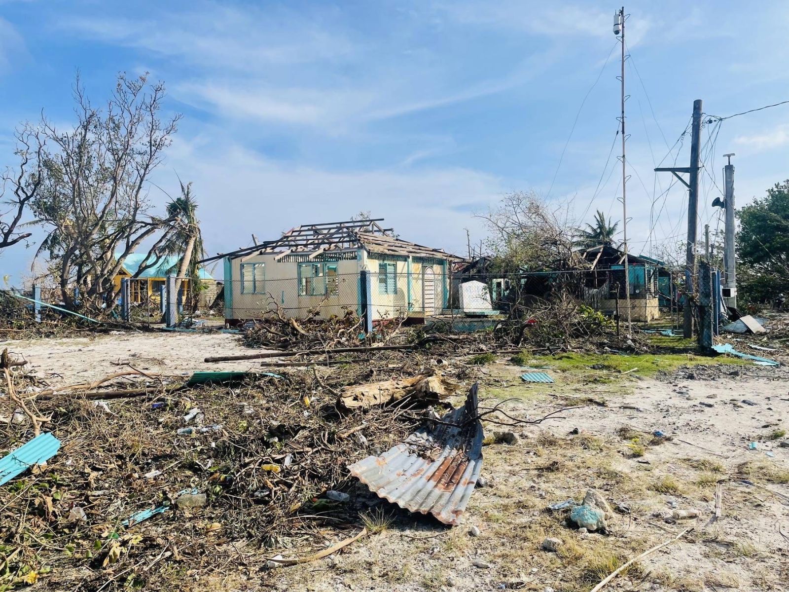 epa09653224 A handout photo made available by Philippine Coast Guard (PCG) shows a view of typhoon devastated Pagasa island (Thitu Island) in the disputed Spratly group of islands in the South China Sea, west of Palawan island, Philippines​, 21 December 2021 (issued on 22 December 2021). Philippine National Police data show that the death toll from typhoon Rai rose to 375 and 56 are missing. More​ than 300,000 people were evacuated from their hom​es and beachfront resorts in central and southern Philippines.  EPA/HO HANDOUT  HANDOUT EDITORIAL USE ONLY/NO SALES
