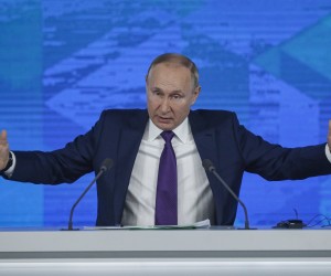 epa09654761 Russian President Vladimir Putin answers a question during his annual life-broadcasted news conference with Russian federal, regional, and foreign media at the Moscow Manege in Moscow, Russia, 23 December 2021. The President's Big Press Conference is an annual event that has been held since 2001. This year, the number of journalists was limited to 507 due to coronavirus.  EPA/YURI KOCHETKOV
